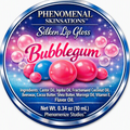 Phenomenal Skinsations Bubblegum Silken Lip Gloss label with pink and blue gumballs on a sparkling blue and purple background, listing the ingredients and a net weight of 0.34 oz