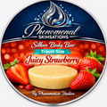 Phenomenal Skinsations Juicy Strawberry travel size Silken Body Bar label showing a round moisture bar beside whole and halved strawberries on a wooden surface