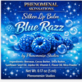 Phenomenal Skinsations Blue Razz Silken Lip Balm label with blue raspberries and bubbles on a sparkling blue background, listing the ingredients and a net weight of 0.17 oz