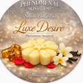 Luxe Desire Pheromone-Inspired Silken Body Bar label by Phenomenize Studios, with a flower-shaped bar, amber-colored stones, vanilla flowers, and rose petals.
